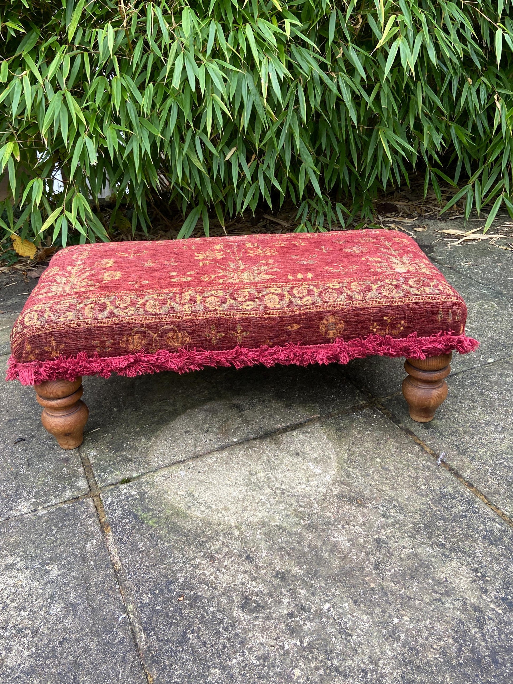 Retro upholstered foot stool - authentic vintage stool with tapestry type upholstery and turned legs (60cm x 23cm x 29cm)
