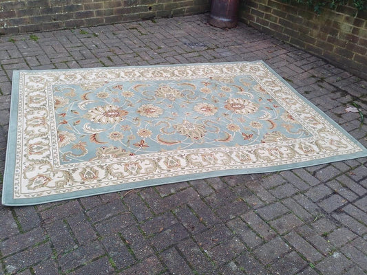 Vintage Turkish Style Rug.  Very large rug with green base colour.  Green patterned rug. VGC rug