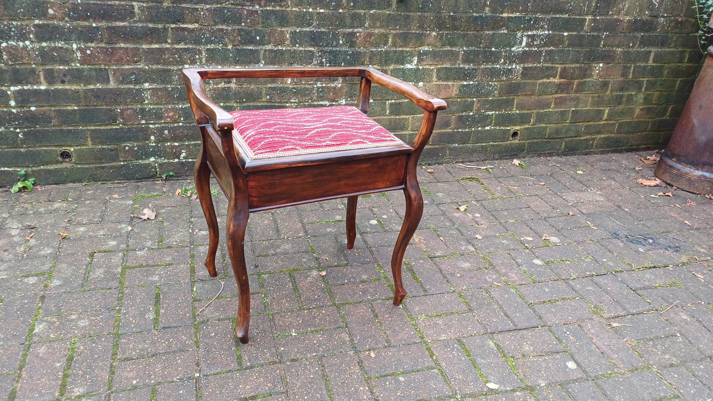 Elegant and Top Quality Vintage Mahogany Piano Stool Upholstered with Sheet Compartment.