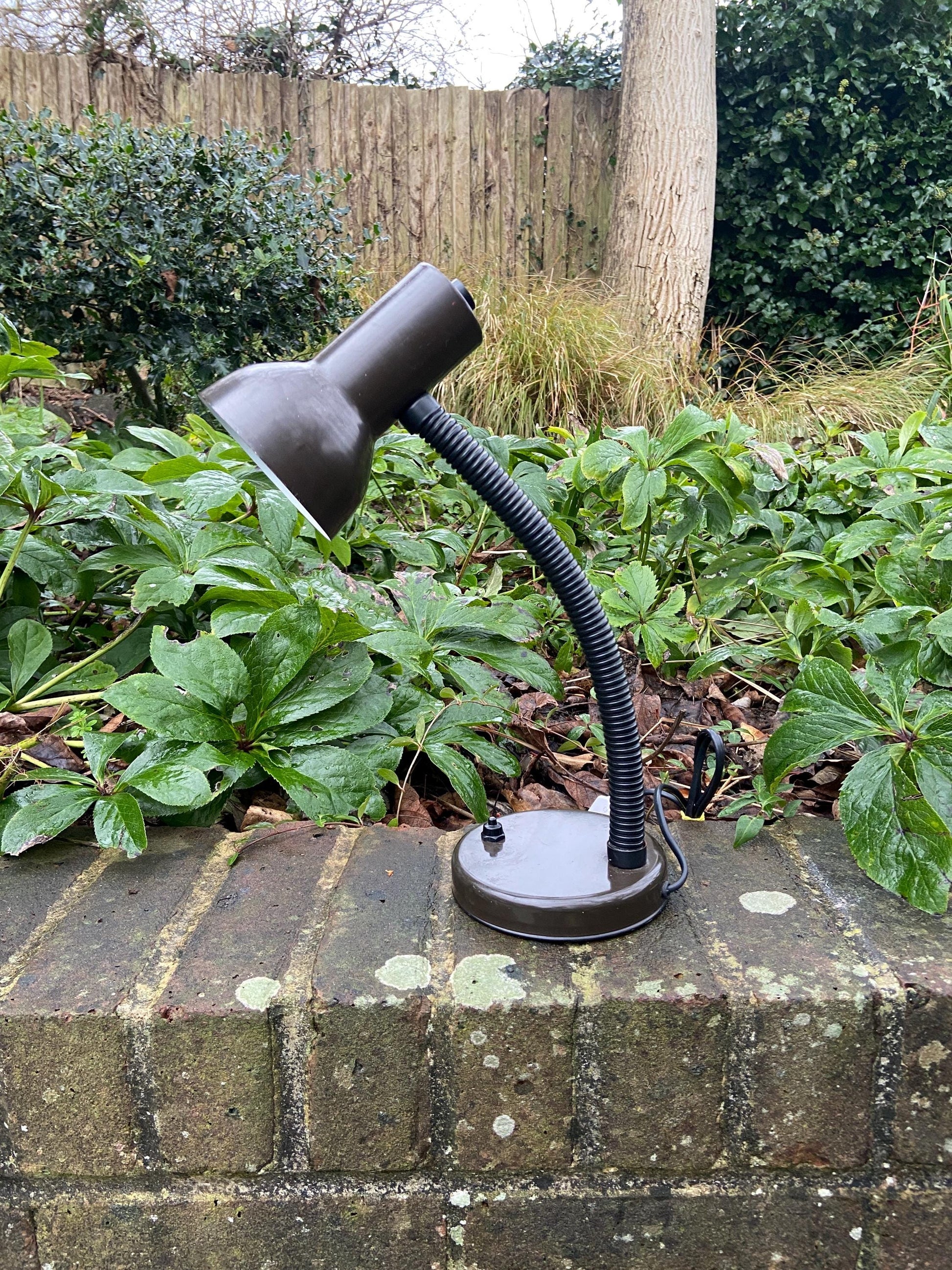 brown adjustable desk lamp from the 1980s. made by Serva Lighting.