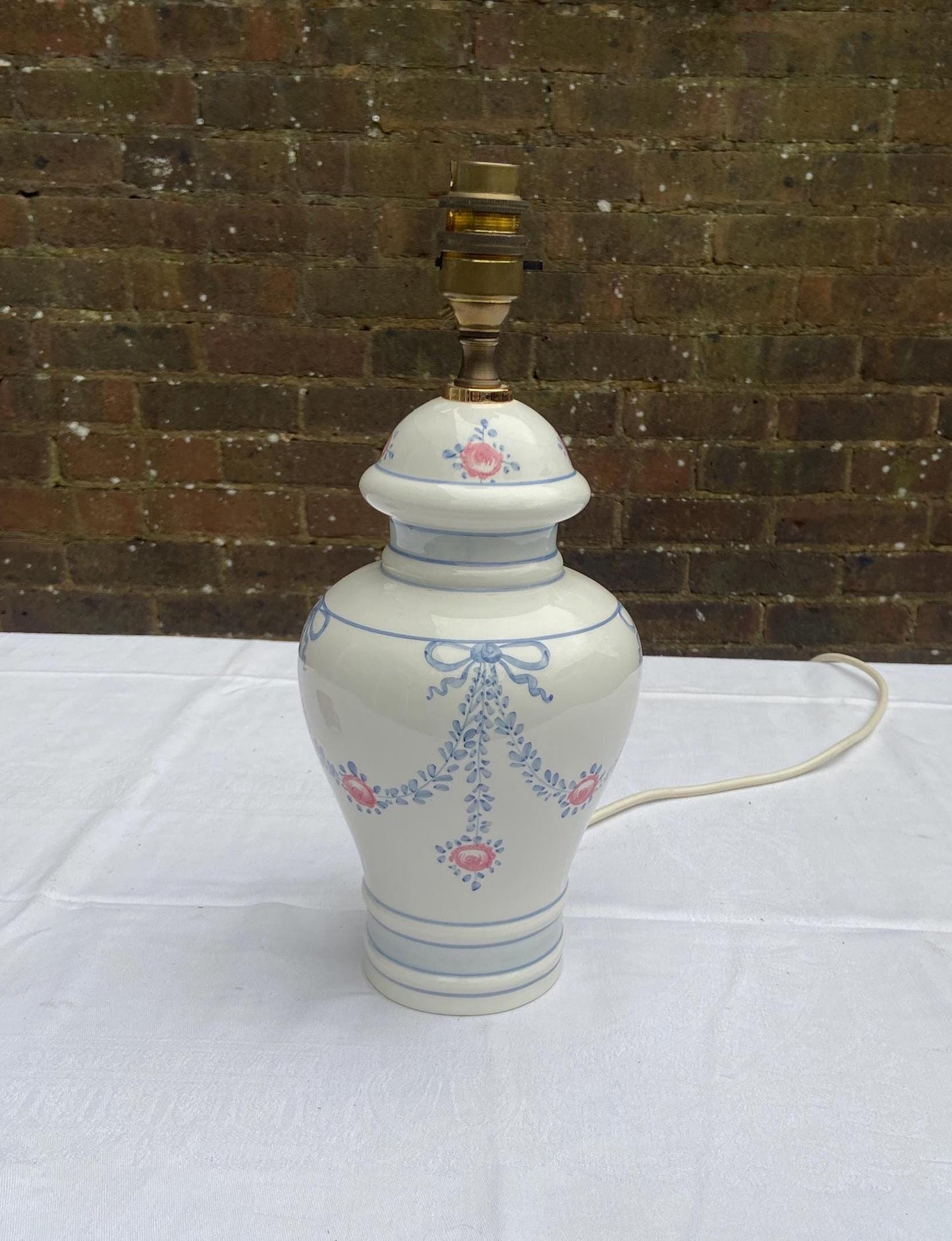 vintage Italian ceramic lamp.  hand painted roses and ribbon design in pink and blue. white pottery lamp. ginger jar shape. tested and working