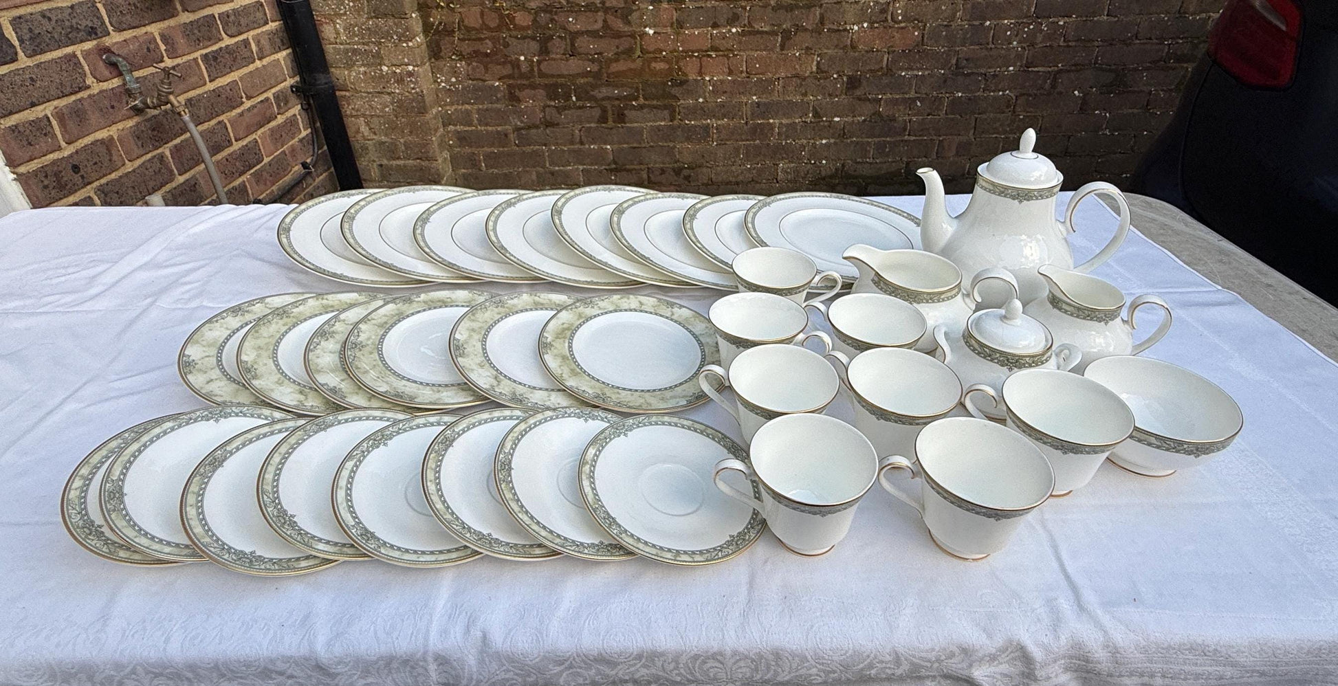 Royal Doulton Isabella dinner service. 37 pieces. including8 dinner plates, tea service and jugs and bowls. VGC