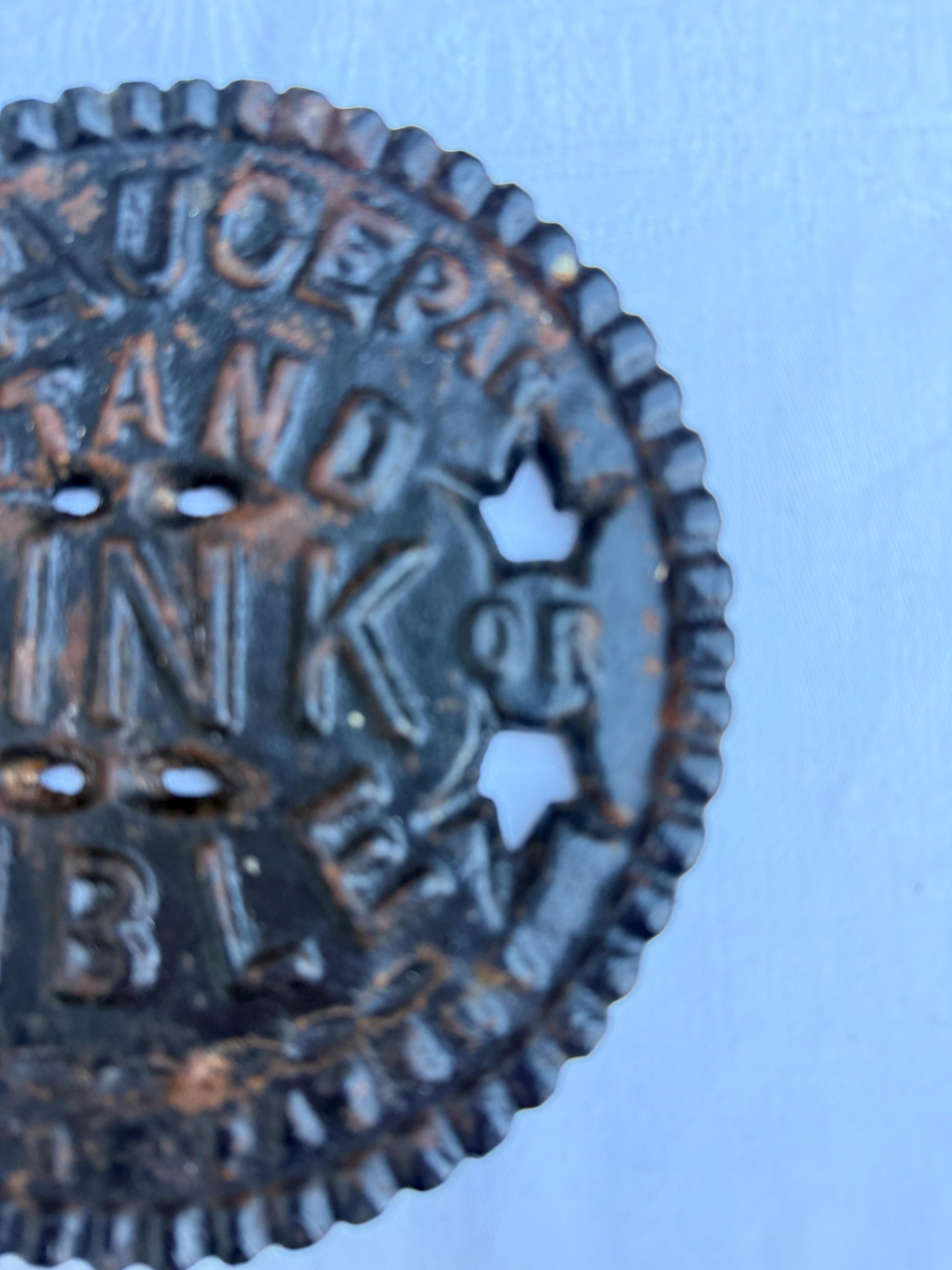 Fantastic heavy iron tivert or pot stand with wording "Saucepan stand for sink or table" - great for kitchens and tables 17cm wide