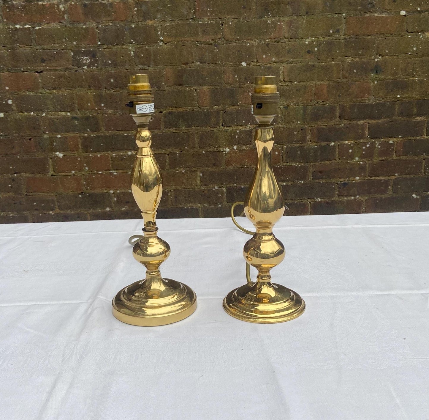 pair medium brass lamps. pair brass lamps. working brass lamps