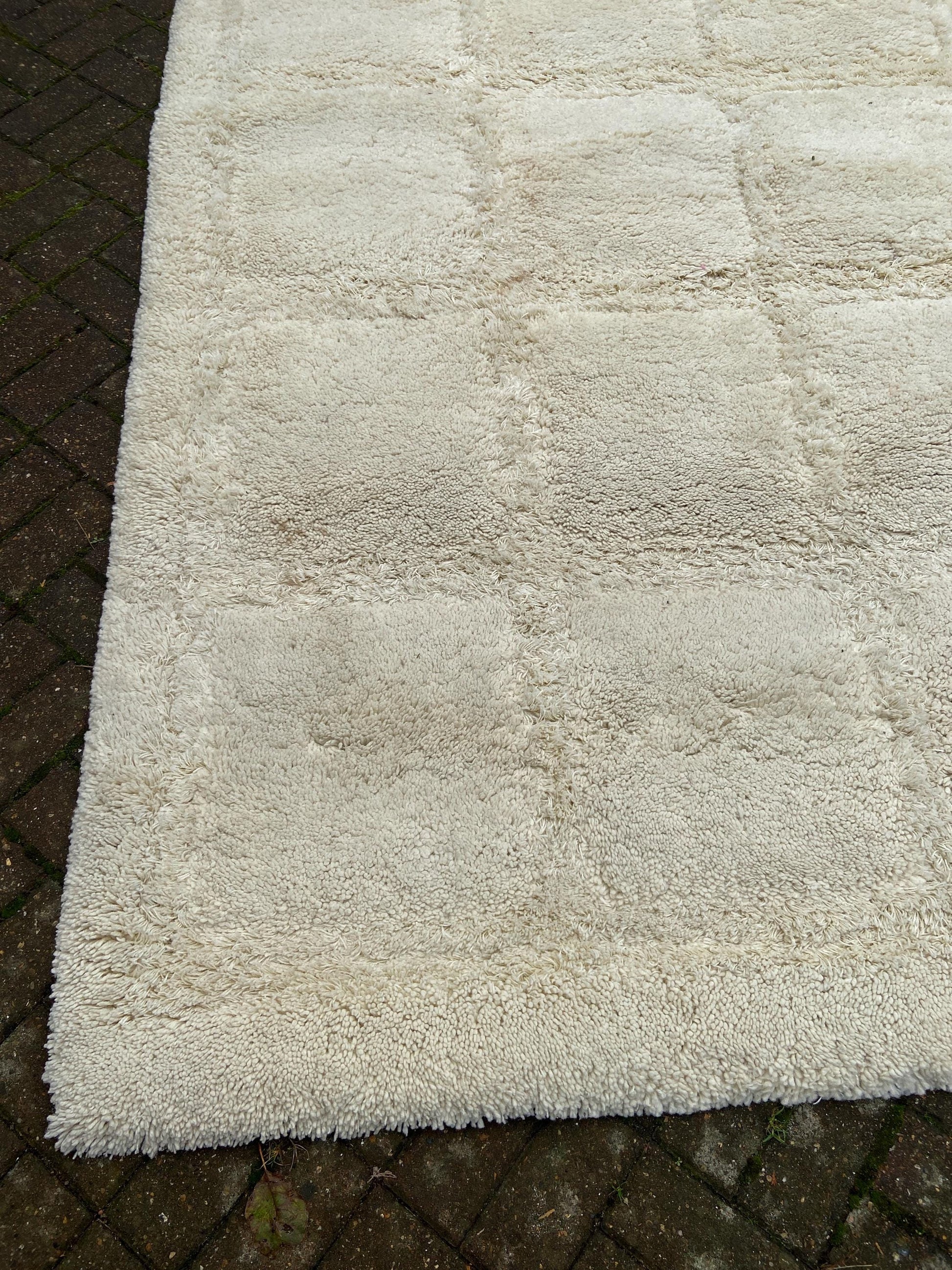 Large vintage shaggy cream rug with contrasting square detail - likely 1980s. Good size 234cm x 158cm