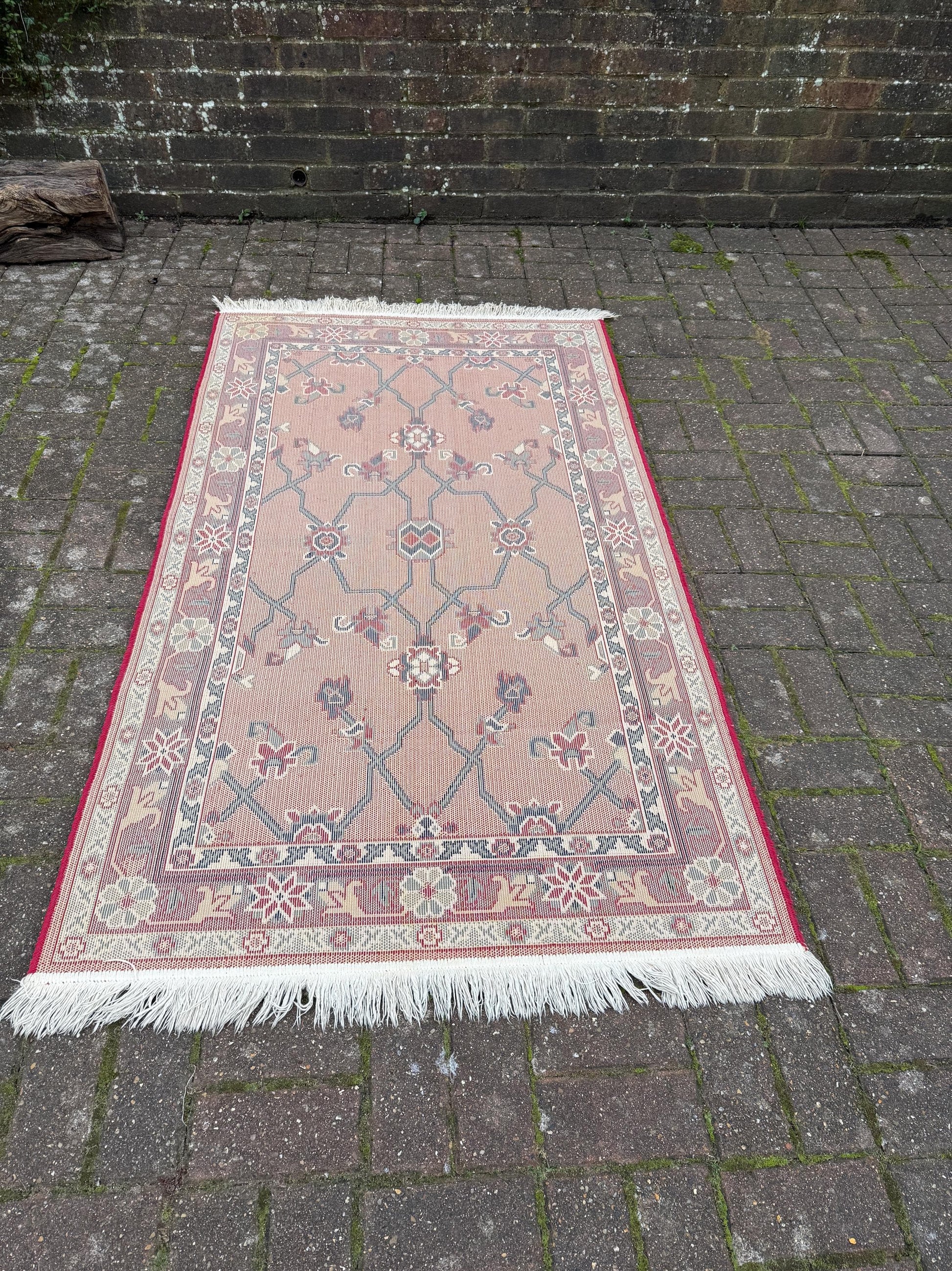 Attractive medium sized vintage rug with pink, red, blue pattern (183cm x 100cm)
