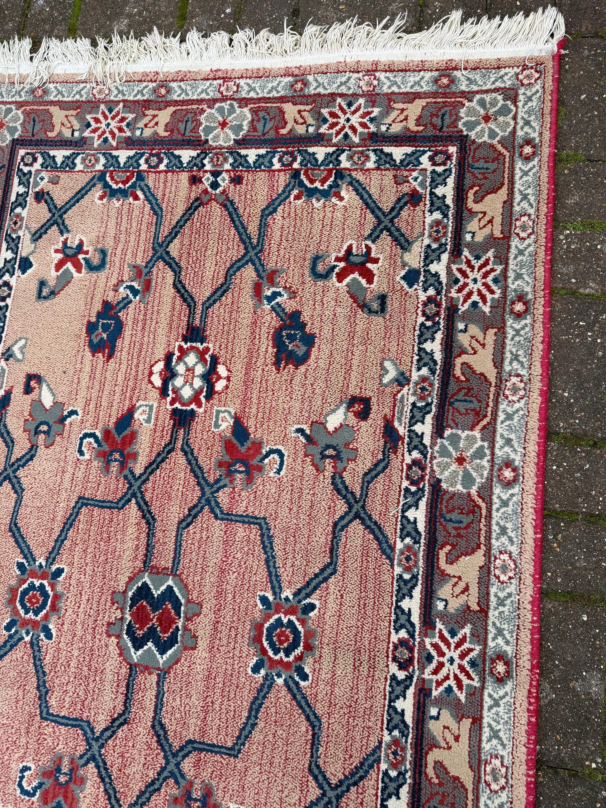 Attractive medium sized vintage rug with pink, red, blue pattern (183cm x 100cm)