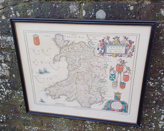 1648 depiction of Wales, Wallia, by JOhan Blaeu and printed by bartholomew. Shows all old places and names. in excellent condition. in vintage midcentury frame.