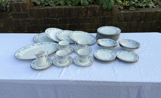 39 pieces of part dinner service by Noritake. Blue Hills. Including dinner plates, soup bowls, cups and saucers. VGC
