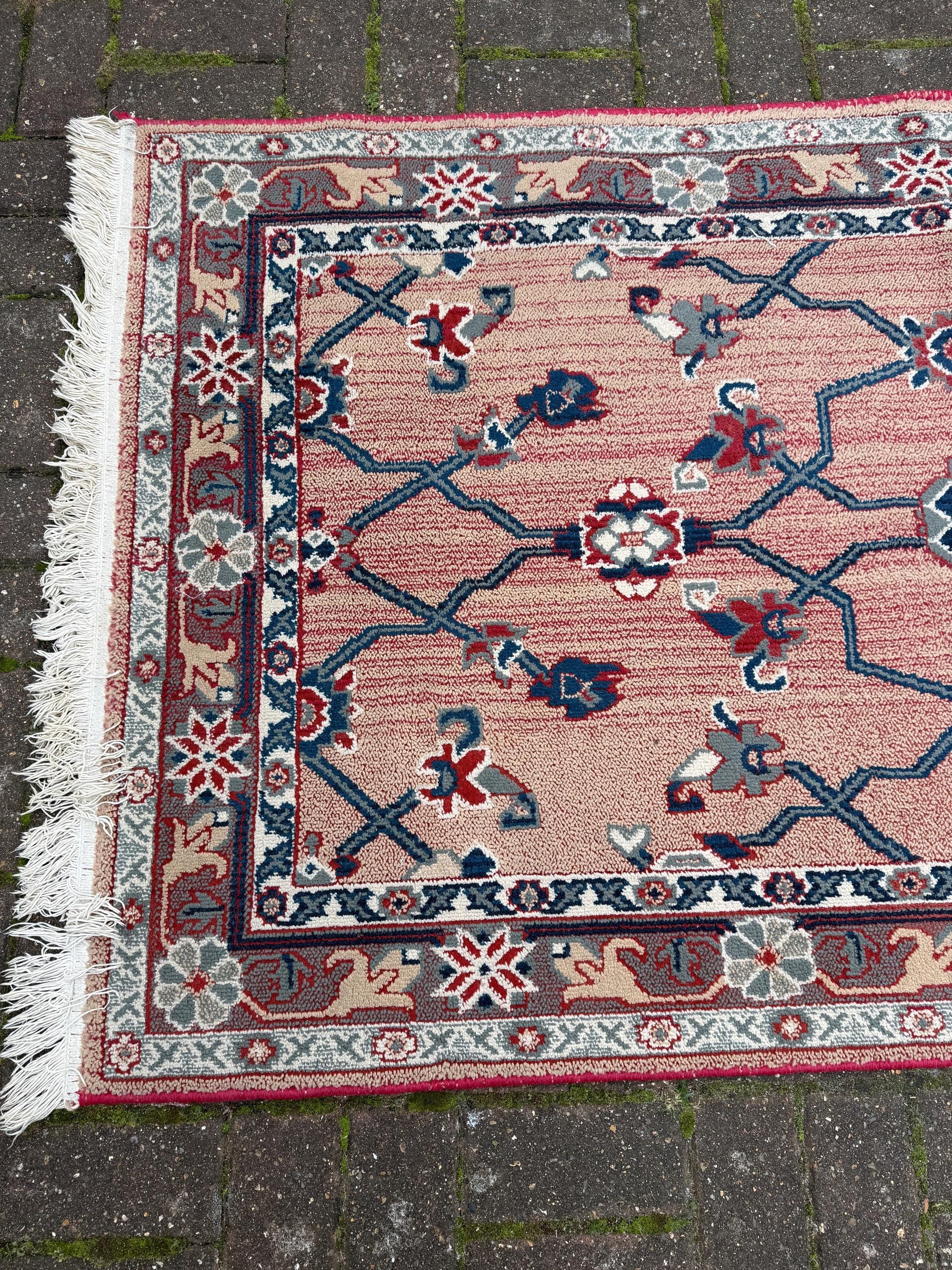 Attractive medium sized vintage rug with pink, red, blue pattern (183cm x 100cm)