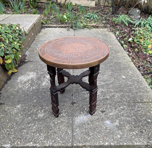 lovely early to mid century Benares coffee table or plant stand.  Wooden carved base with brass engraved top. An early example of these very popular tables. VGC