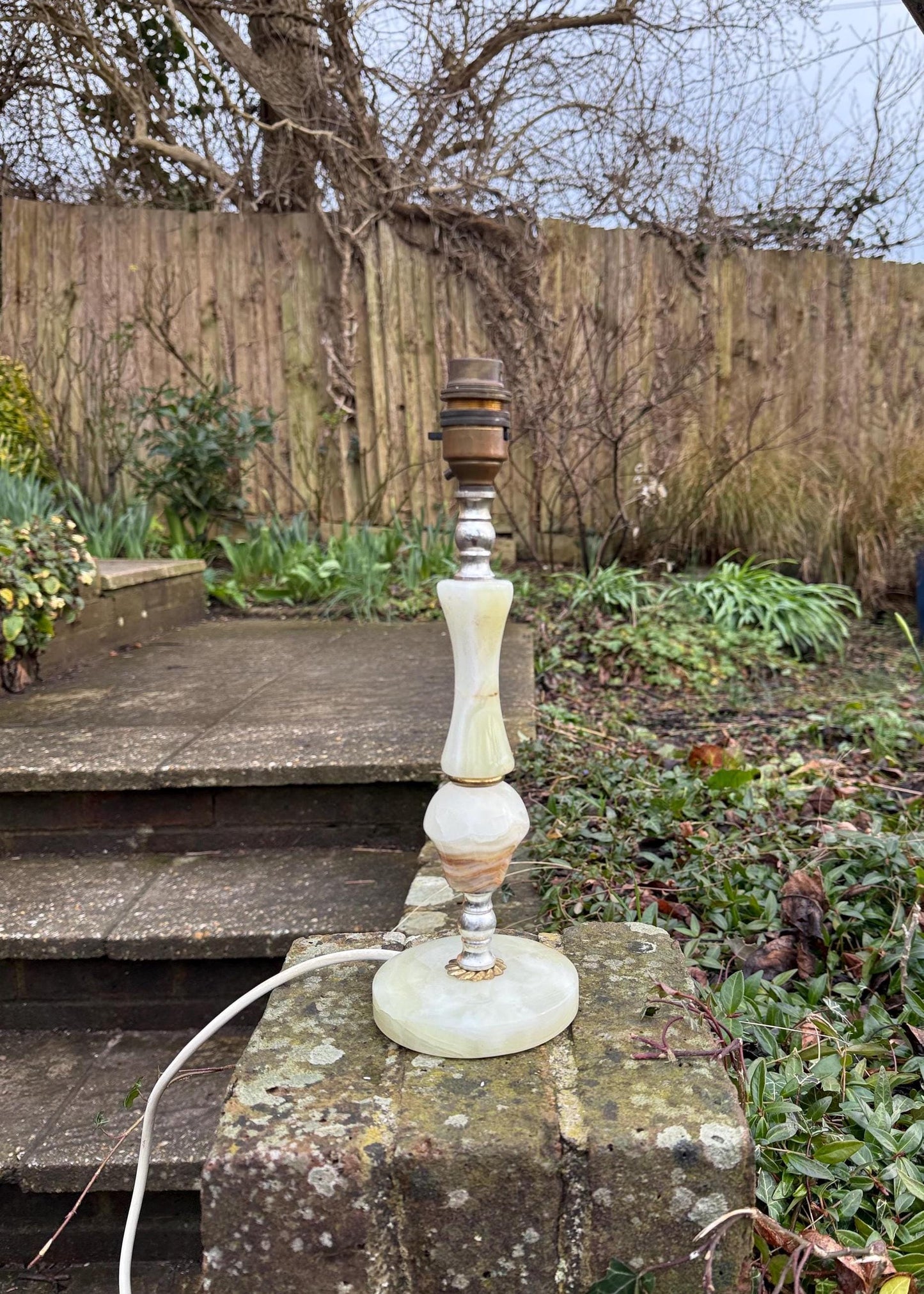 small vintage retro table lamp in onyx and metal. the onyx is light green, creams and browns. Stone is in vgc. Metal detail is worn in places. small lamp. sold as working