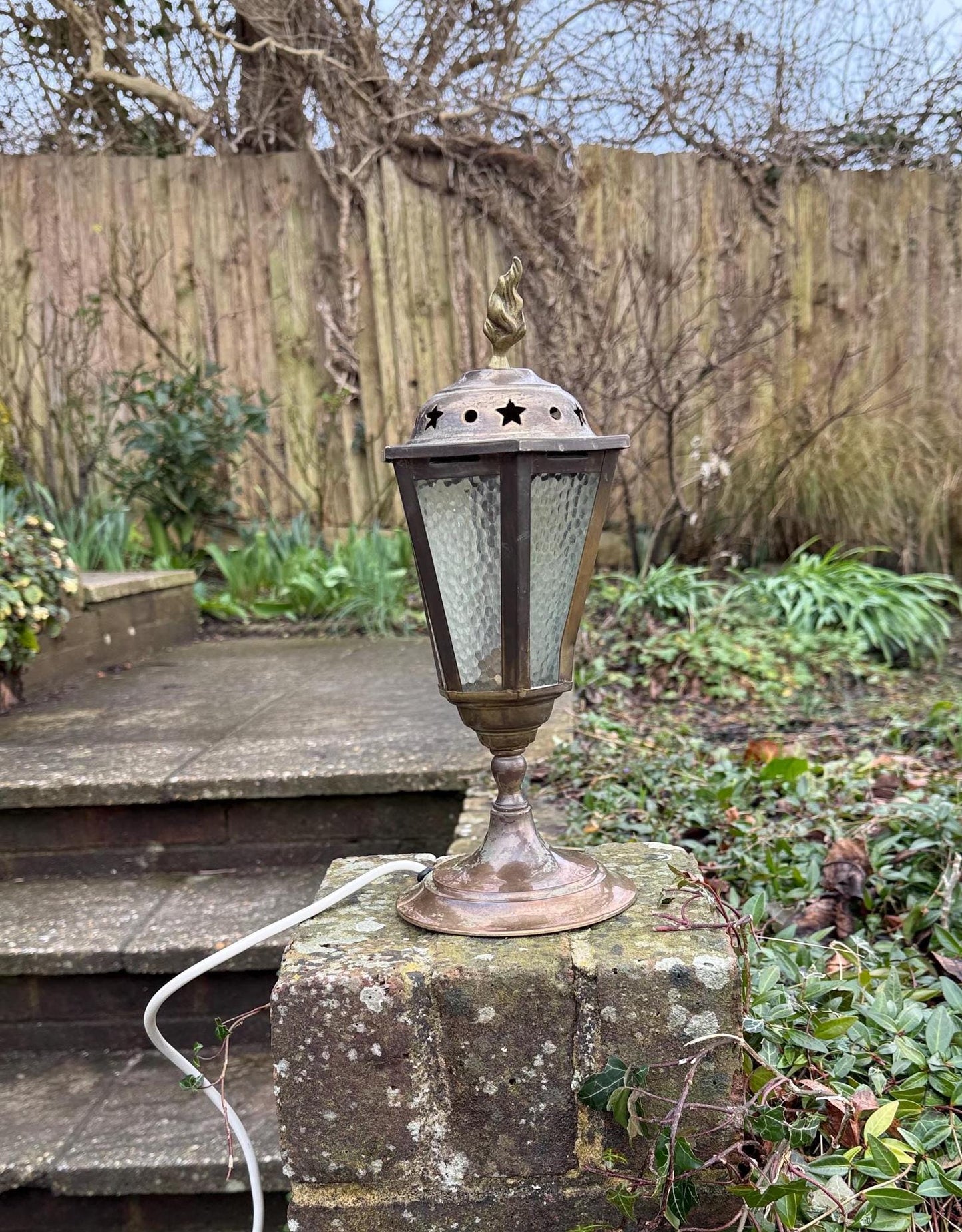 mock outdoor lantern or lamp made into a table lamp style vintage lamp. retro vintage table lamp in lantern style. working vintage lamp