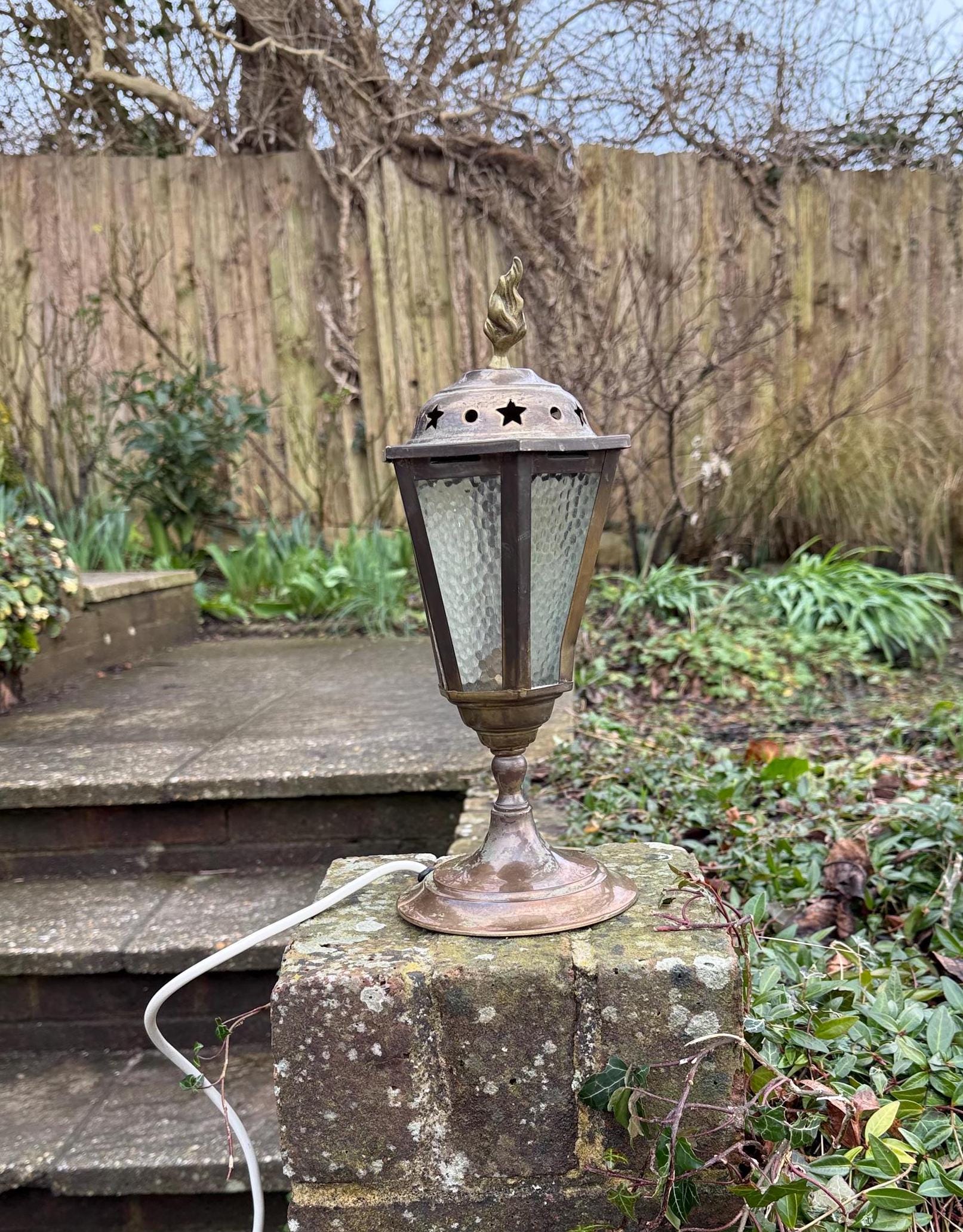 mock outdoor lantern or lamp made into a table lamp style vintage lamp. retro vintage table lamp in lantern style. working vintage lamp