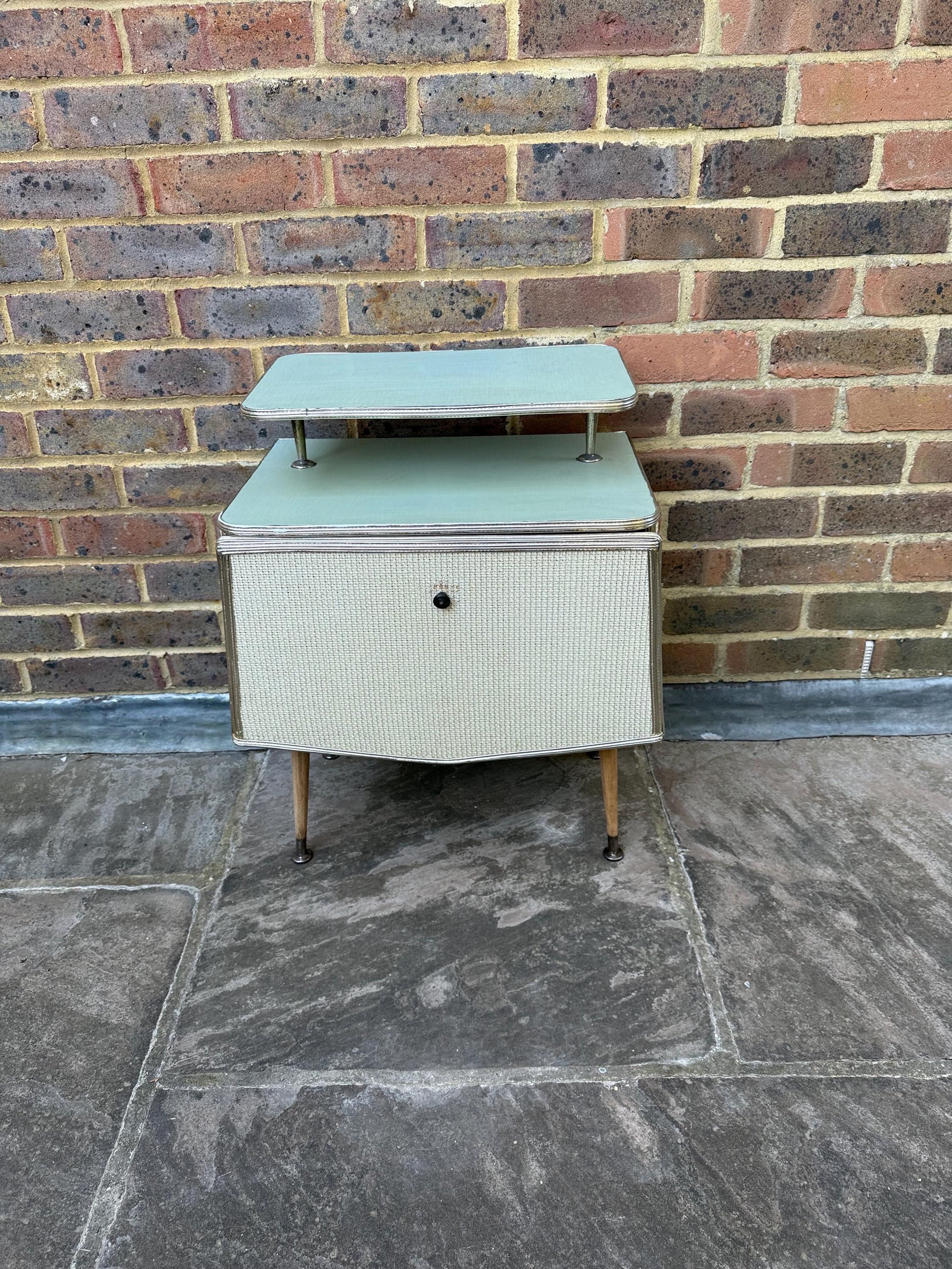 Rare mid-century bedside cupboard, super retro style with woven detail, chrome effect and tapered legs