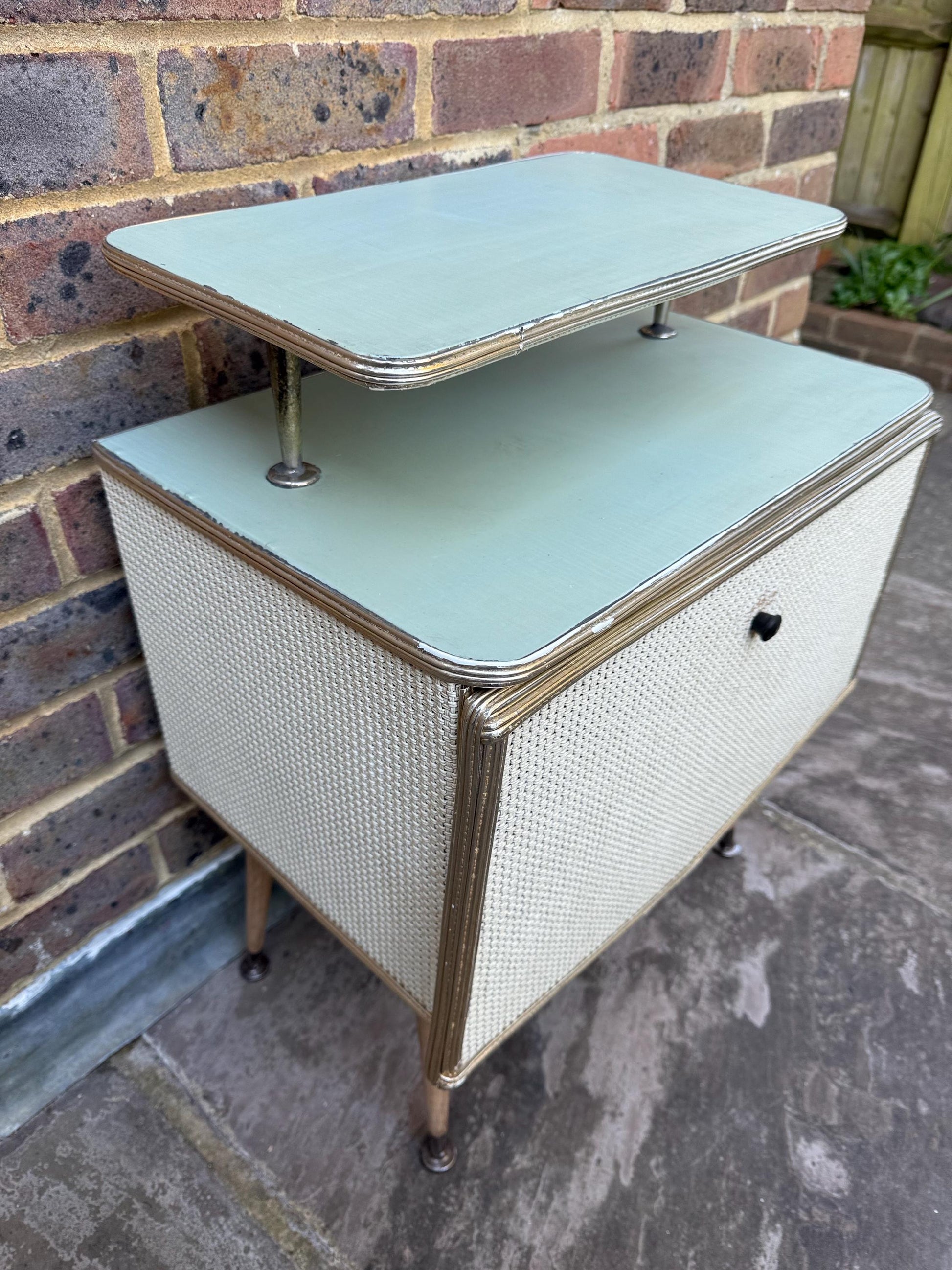 Rare mid-century bedside cupboard, super retro style with woven detail, chrome effect and tapered legs