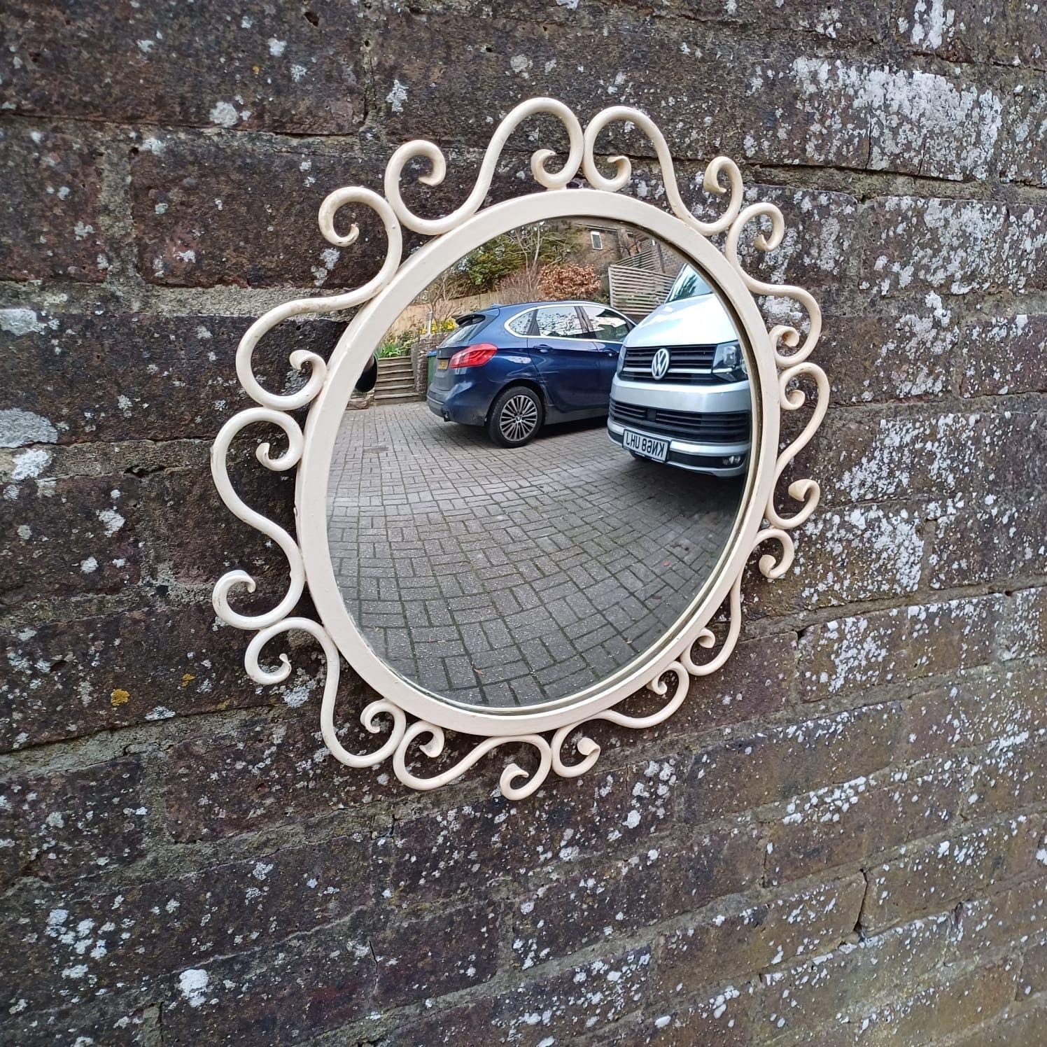 Vintage scrollwork round mirror with chain hanger and original wooden back - mid-century, French provincial revival - small wall mirror