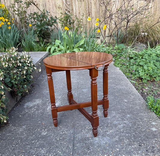 1980s folding table.  wooden table with collapsible top, folding down top. perfect as wine table, lamp table, coffee table