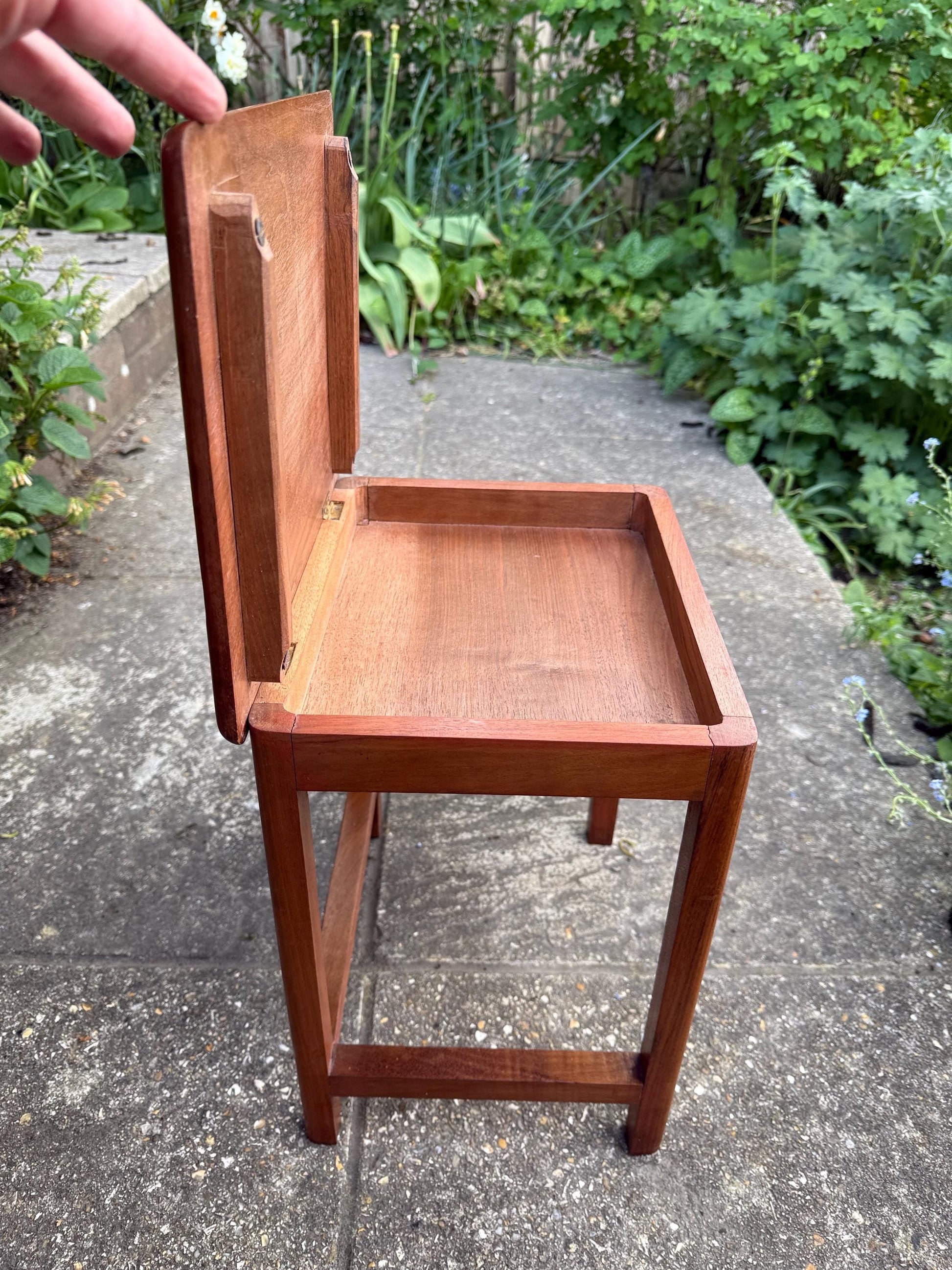 Delightful hand carved vintage 1950s occasional table with secret storage compartment; small side table, plant stand, mid century table