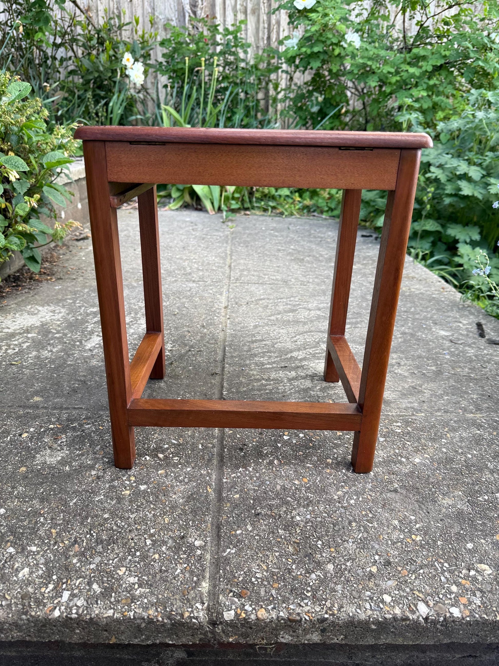 Delightful hand carved vintage 1950s occasional table with secret storage compartment; small side table, plant stand, mid century table