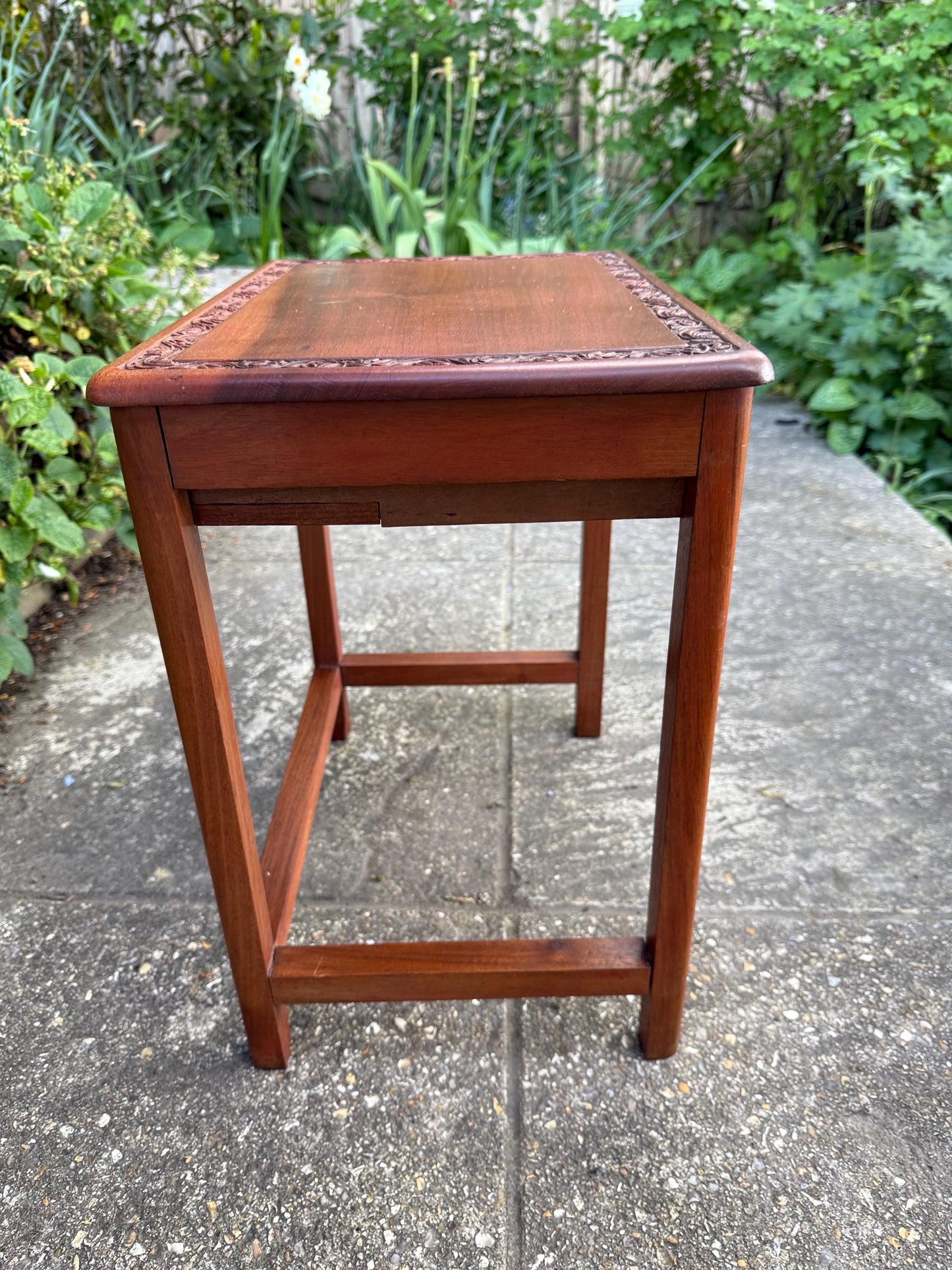 Delightful hand carved vintage 1950s occasional table with secret storage compartment; small side table, plant stand, mid century table