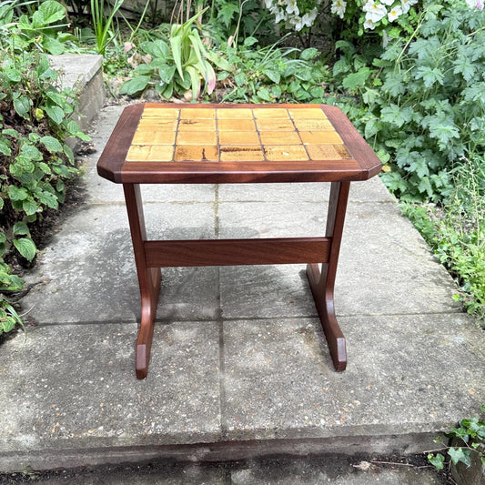 teak small table with tiled top. lovely small table with sled splayed legs and ochre yellow hand made tiles on the top