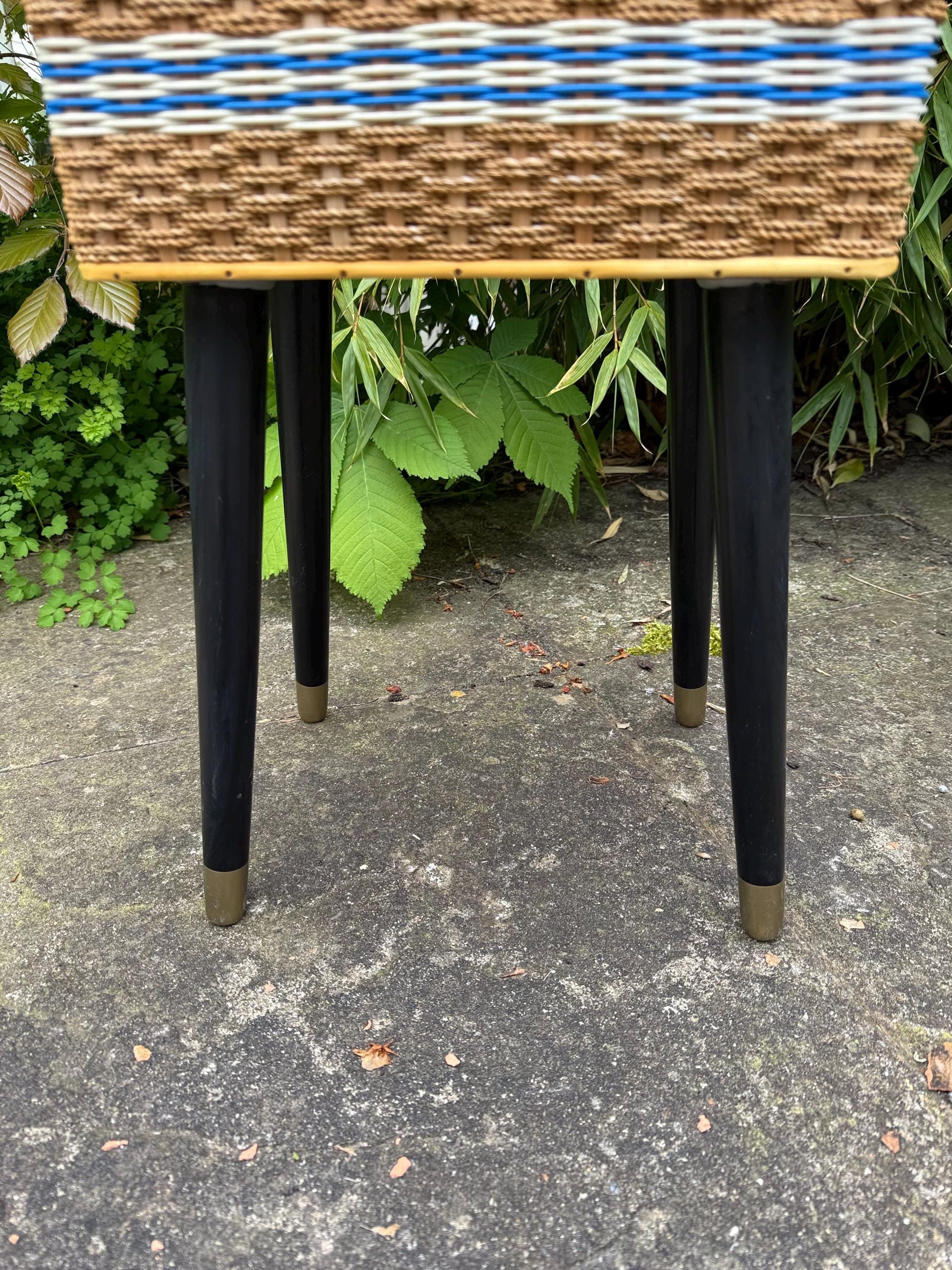 Vintage mid-century wicker sewing box on metal capped tapered legs, retro craft storage, with blue lid and metal tipped legs, 1950s workbox