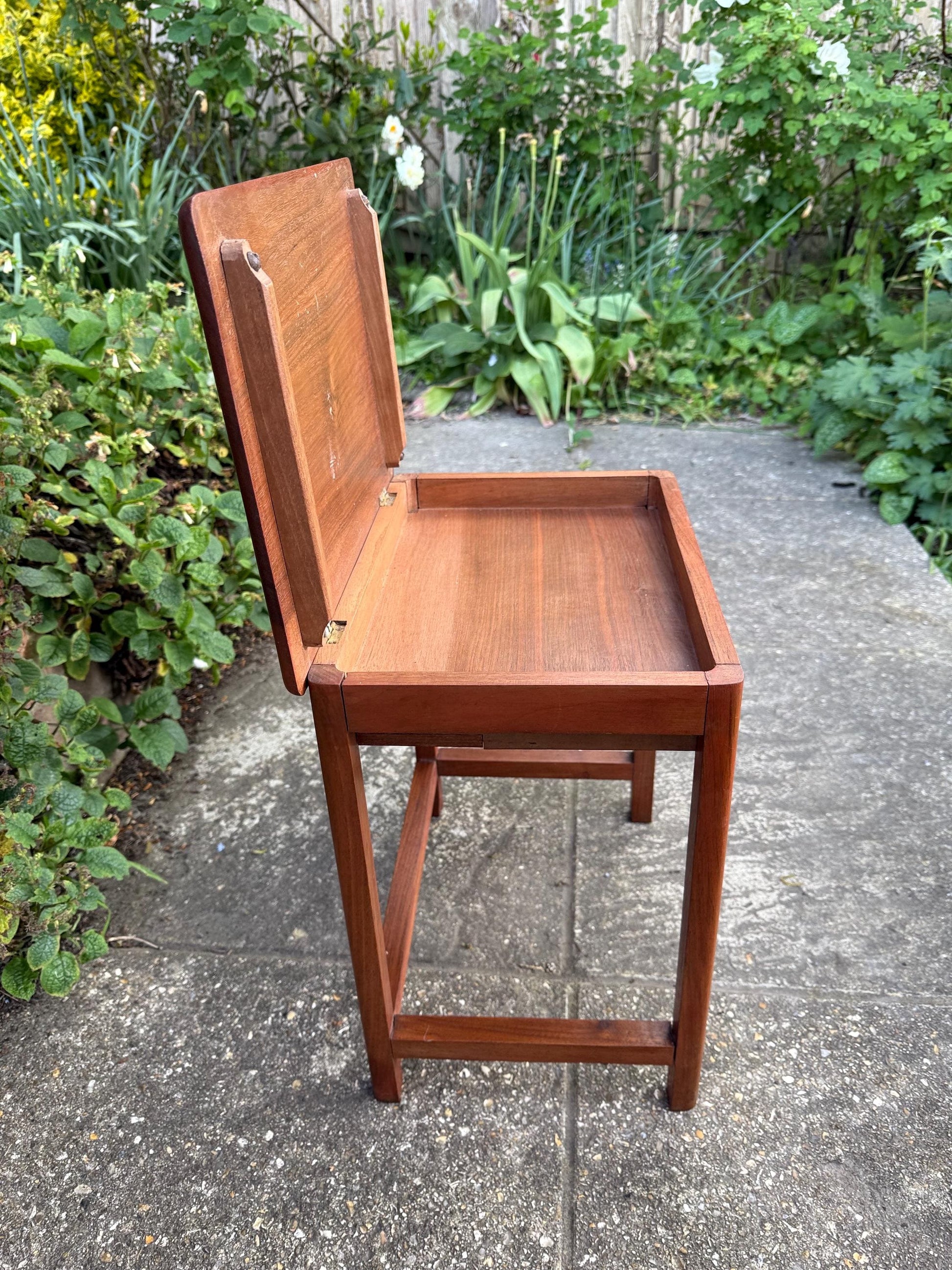 Delightful hand carved vintage 1950s occasional table with secret storage compartment; small side table, plant stand, mid century table