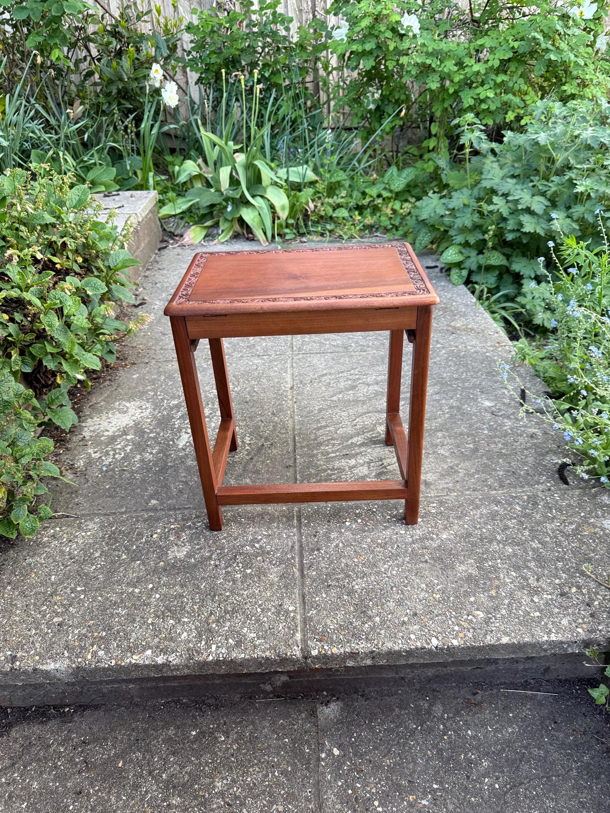 mid century table with secret compartment. plant stand in mahogany style wood. 1950s wooden small table with carved leaf detail
