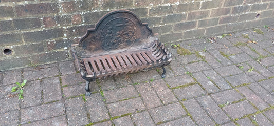 Antique Cast Iron Fire Grate with Decorative Relief Panel – Ornate 19th Century Style Fireplace Basket with Claw Feet