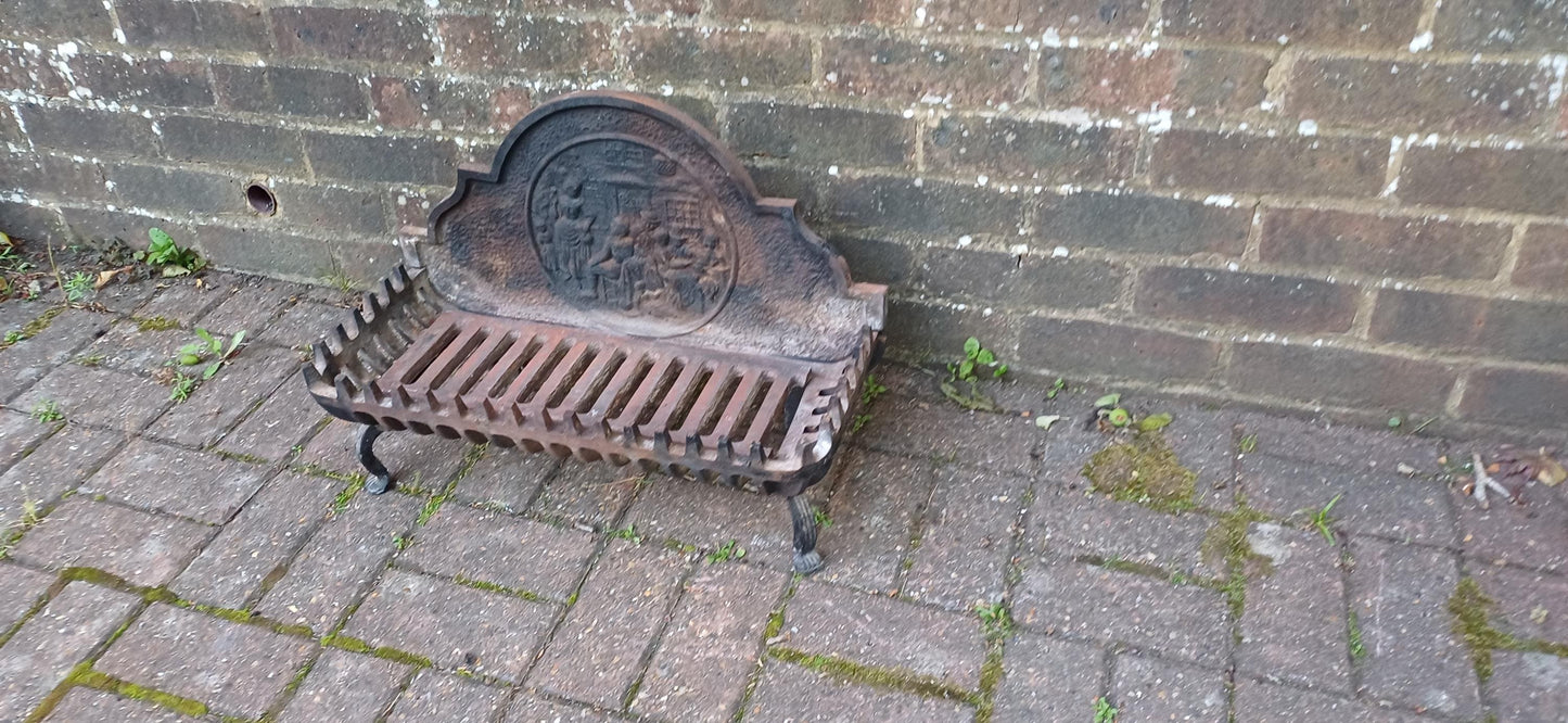 Antique Cast Iron Fire Grate with Decorative Relief Panel – Ornate 19th Century Style Fireplace Basket with Claw Feet