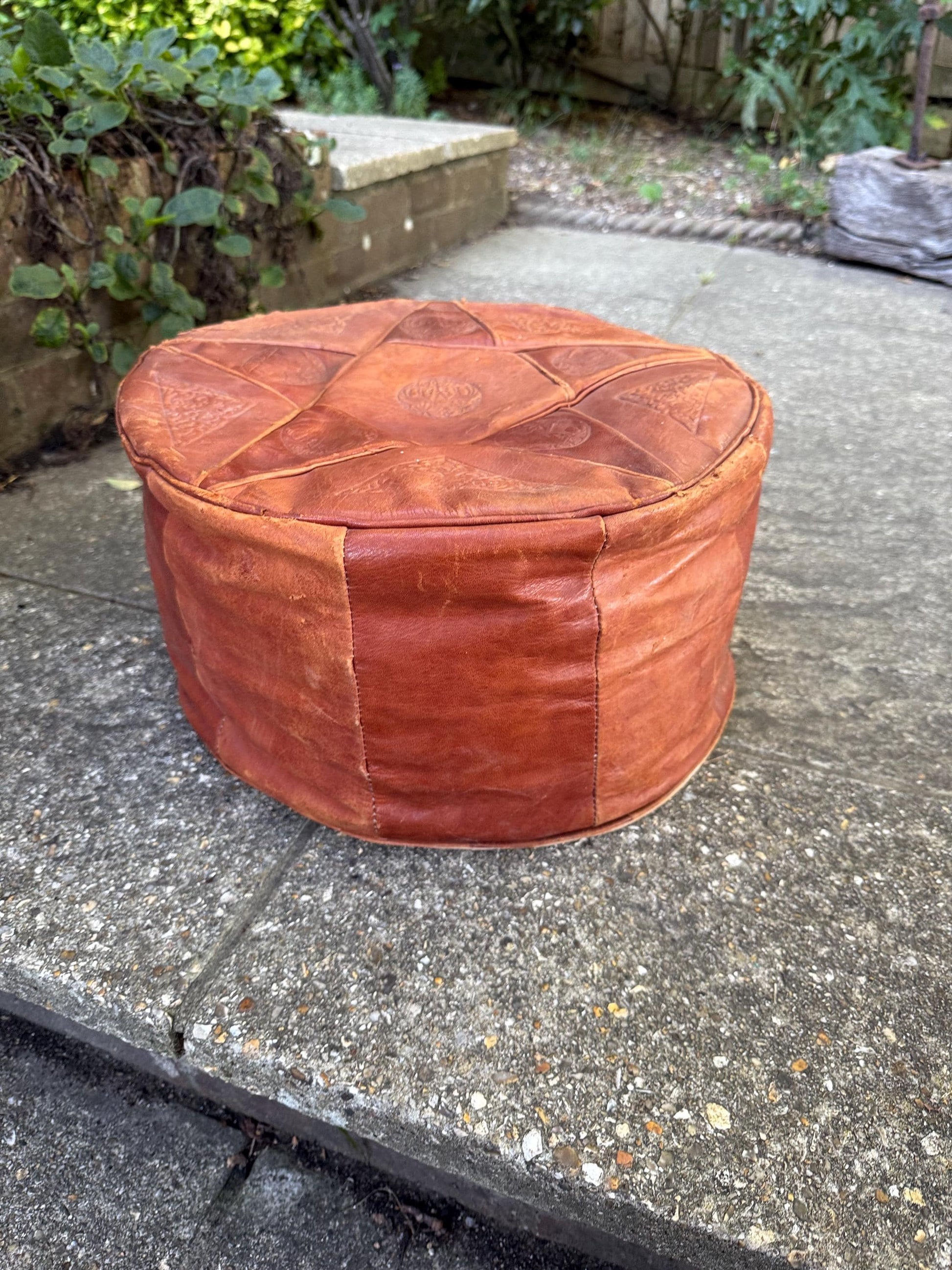 Vintage Leatherette Moroccan-Style Pouf – Embossed Tan Footstool with threaded Base, rustic and comfy