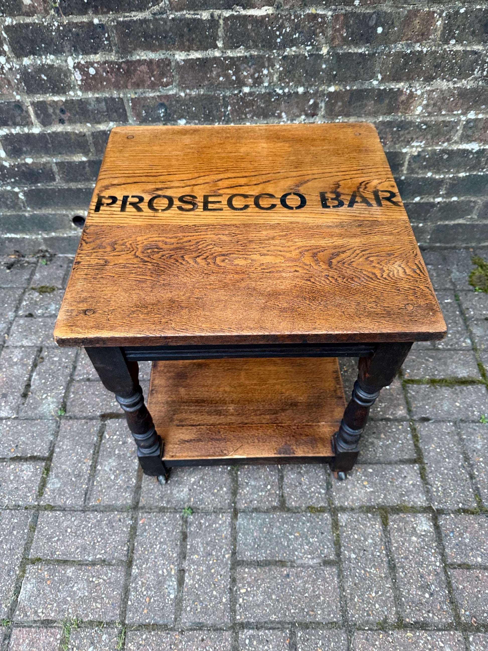 Vintage upcycled solid oak trolley / side table. Sanded and oiled top and shelf. Wheels. Prosecco Bar label. Cocktail table, Bar furniture