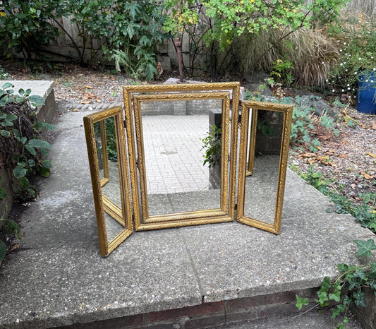 triple folding mirror for a dressing table. gilt ornate detail. 1970s. rococco style