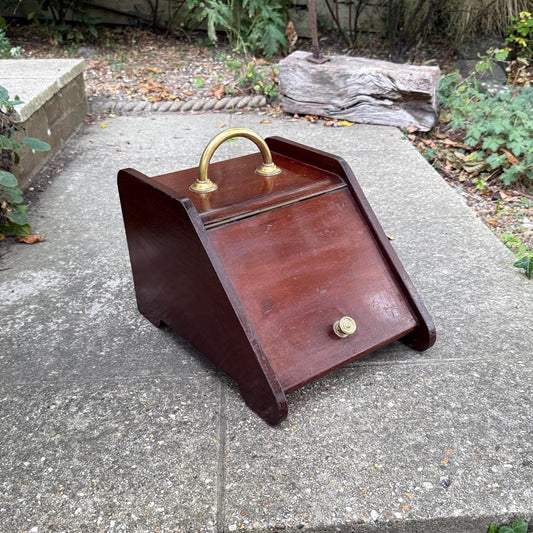 wooden mahogany coal scuttle with brass details. dark wood. handle, knob and holder for shovel.  in good vintage condition