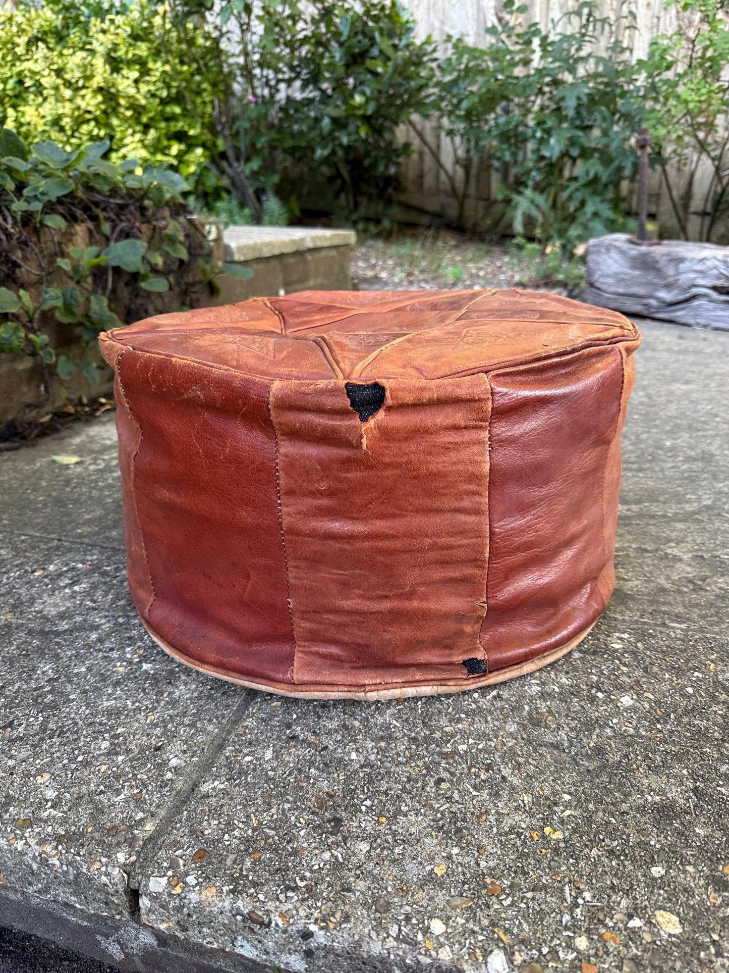 Vintage Leatherette Moroccan-Style Pouf – Embossed Tan Footstool with threaded Base, rustic and comfy