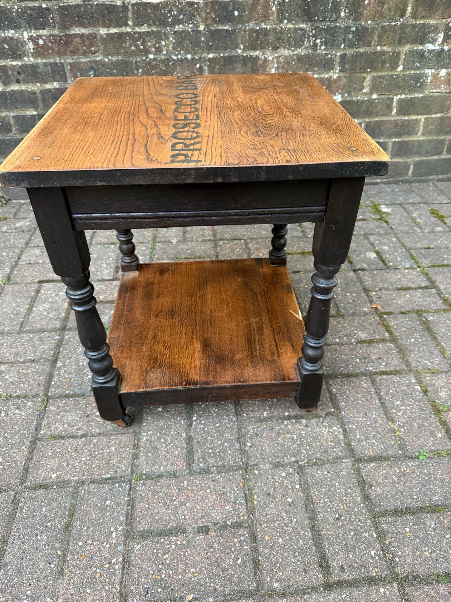 Vintage upcycled solid oak trolley / side table. Sanded and oiled top and shelf. Wheels. Prosecco Bar label. Cocktail table, Bar furniture