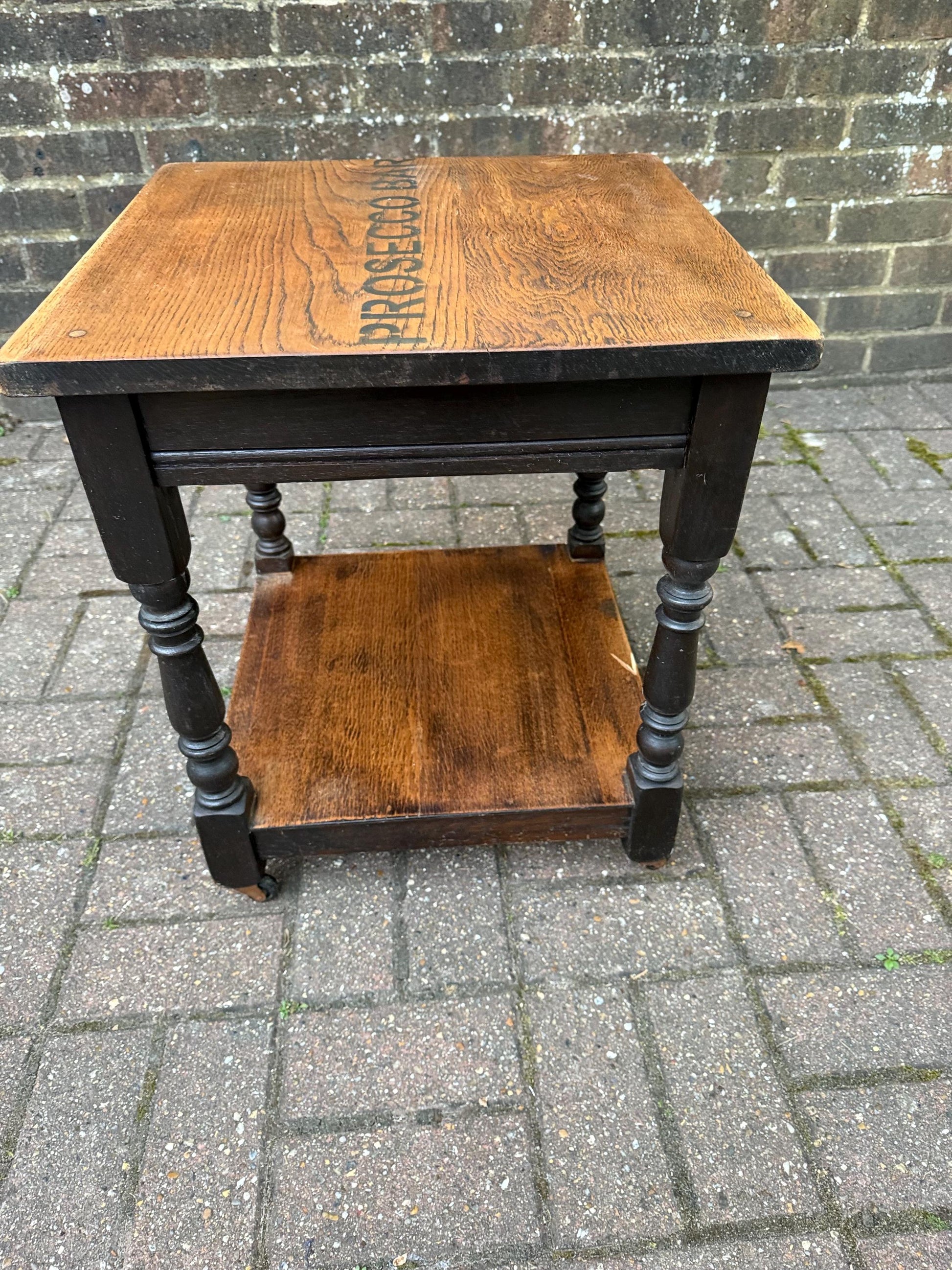 Vintage upcycled solid oak trolley / side table. Sanded and oiled top and shelf. Wheels. Prosecco Bar label. Cocktail table, Bar furniture