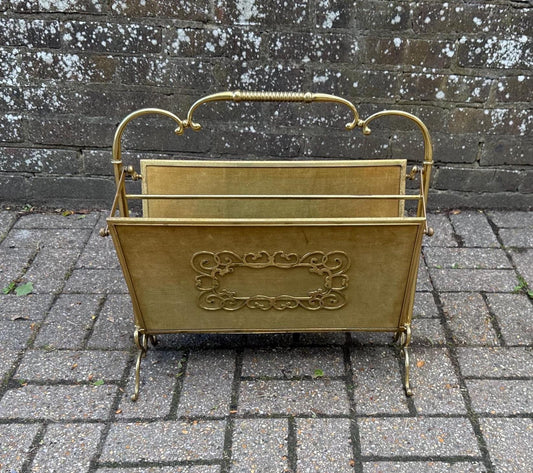 folding metal and velvet mid century rack. lovely magazine rack with gorgeous detail including a folding mechanism for easy storage and movement