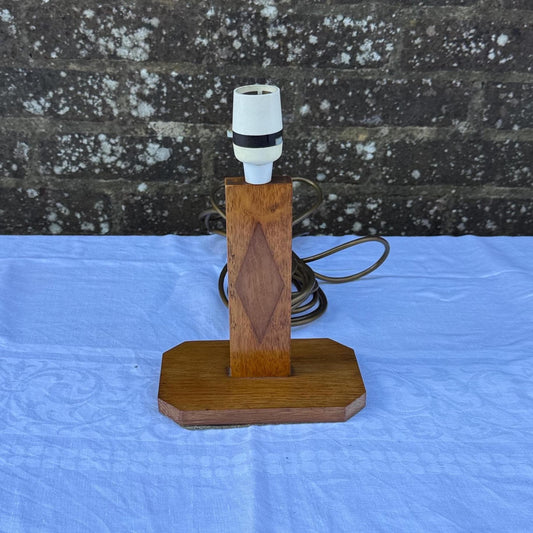mid century handmade wooden geometric lamp base. light golden wood with marquetry design in the column. vintage lightbulb fitment and long flex.