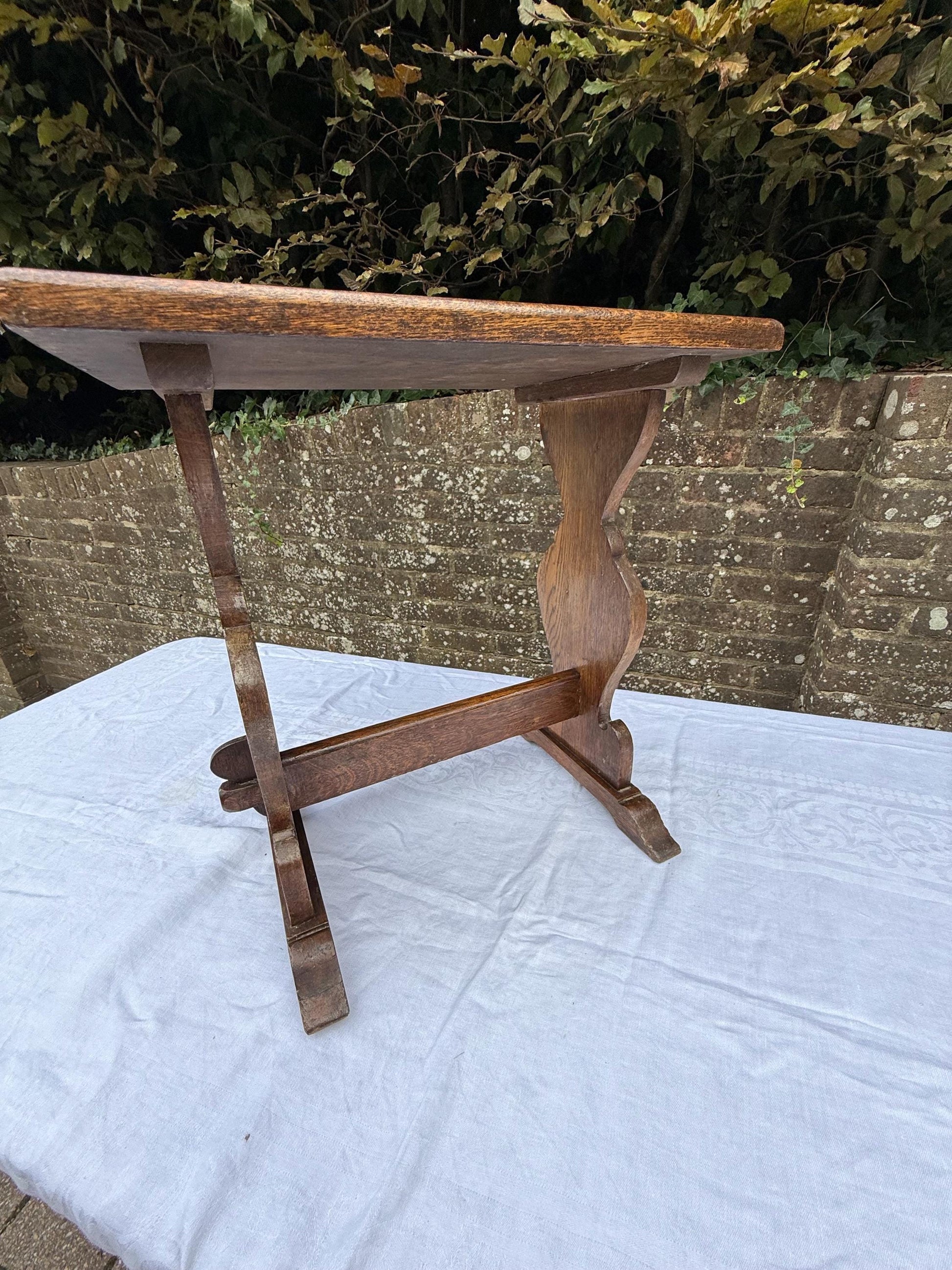 Antique Arts & Crafts Oak Side Table, Early 20th Century English Rustic Occasional Table with Carved Trestle Base