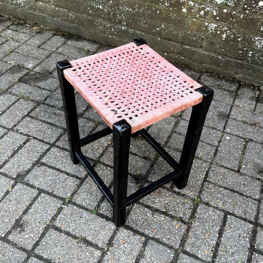 pink and black vintage stool. wooden frame and woven seat. vgc
