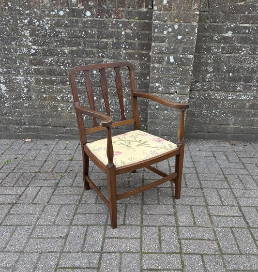 early 1900s mahogany carver chair, mahogany arm chair. 1920s chair. carved back. upholstered seat in pretty floral fabric