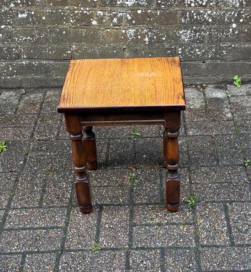 mid century hardwood heavy quality table. stripped top . great little plant stand and occasional table. turned legs