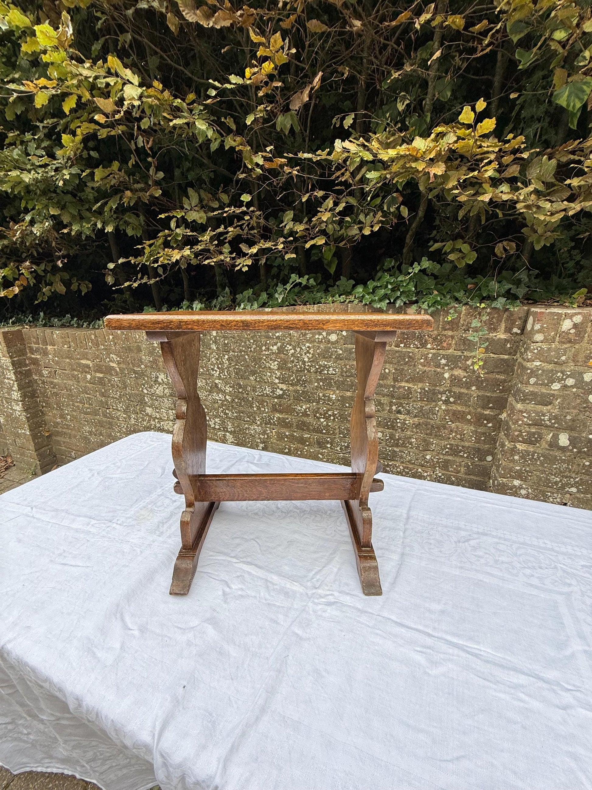 Antique Arts & Crafts Oak Side Table, Early 20th Century English Rustic Occasional Table with Carved Trestle Base