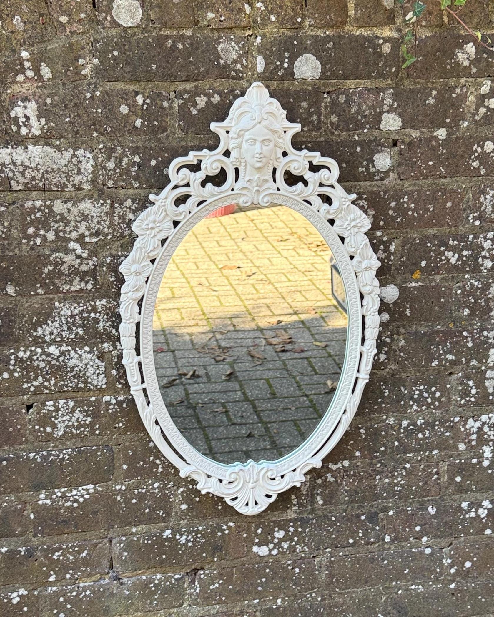 heavy quality white painted metal framed mirror. 1970s mirror. quality oval mirror with decorative metal frame