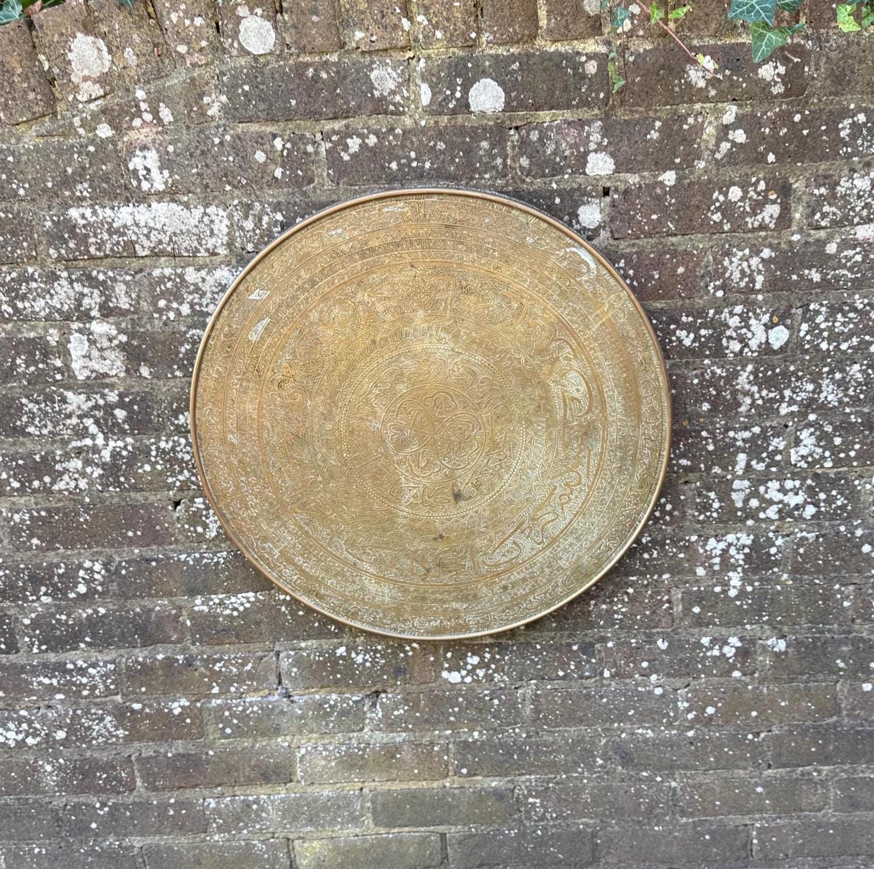 1900s brass tray, brass table top. brass wall decor. boho wall hanging.