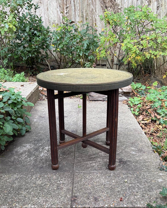 1900s benares brass tray table. folding table with brass tray. middle eastern table.  north african table. ethnic and bohemian decor