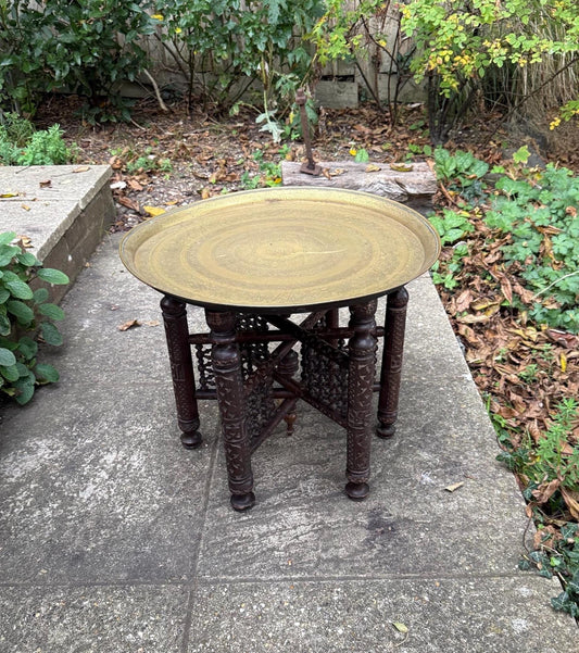 carved moorish style table with brass tray top. middle eastern table. folding table. colonial table style.