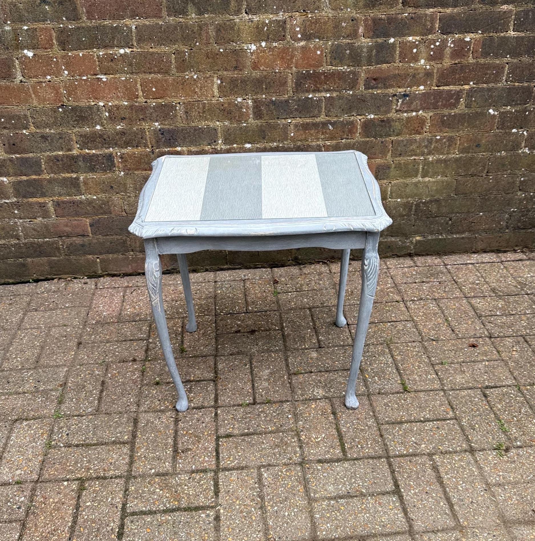 vintage upcycled 1960s table painted in gey paint and shabby chic. glass top with changeable paper insert